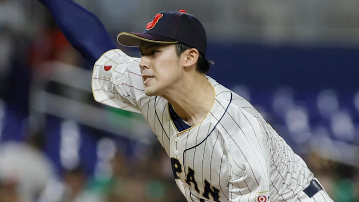 Mar 20, 2023; Miami, Florida, USA; Japan starting pitcher Roki Sasaki (14) delivers a pitch during the first inning against Mexico at LoanDepot Park Mar 20, 2023; Miami, Florida, USA; Japan starting pitcher Roki Sasaki (14) delivers a pitch during the first inning against Mexico at LoanDepot Park