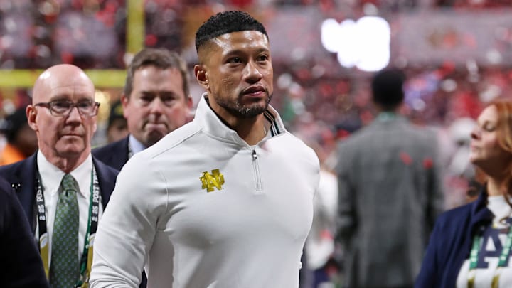 Jan 20, 2025; Atlanta, GA, USA; Notre Dame Fighting Irish head coach Marcus Freeman reacts after losing against the Ohio State Buckeyes in the CFP National Championship college football game at Mercedes-Benz Stadium. 