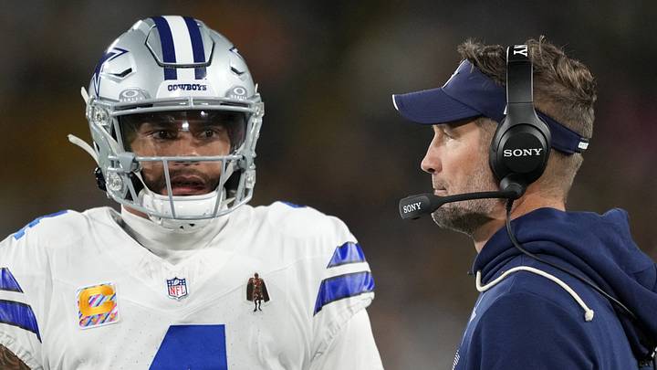 Dallas Cowboys quarterback Dak Prescott with head coach Brian Schottenheimer Dallas Cowboys quarterback Dak Prescott with head coach Brian Schottenheimer