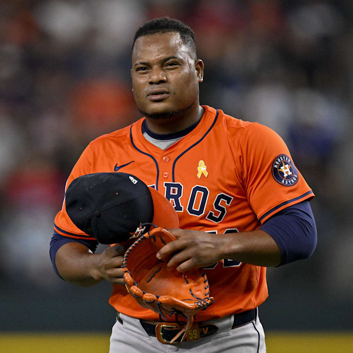 Houston Astros starting pitcher Framber Valdez (59) walks off the field.