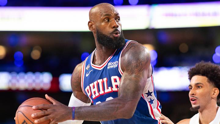 Oct 22, 2026; Philadelphia, Pennsylvania, USA; Philadelphia 76ers forward LeBron James (23) controls the ball against Cleveland Cavaliers guard Tyrese Proctor (24) during the second quarter at Xfinity Mobile Arena. 