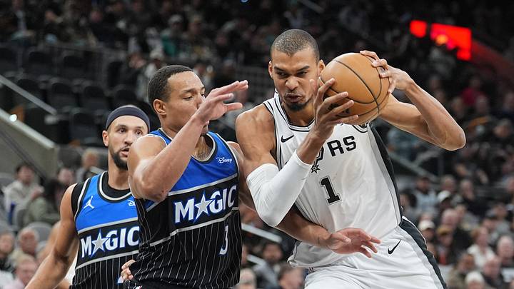 Feb 1, 2026; San Antonio, Texas, USA; San Antonio Spurs forward Victor Wembanyama (1) goes in against Orlando Magic guard Desmond Bane (3) in the first half at Frost Bank Center. Mandatory Credit: Daniel Dunn-Imagn Images Feb 1, 2026; San Antonio, Texas, USA; San Antonio Spurs forward Victor Wembanyama (1) goes in against Orlando Magic guard Desmond Bane (3) in the first half at Frost Bank Center. Mandatory Credit: Daniel Dunn-Imagn Images