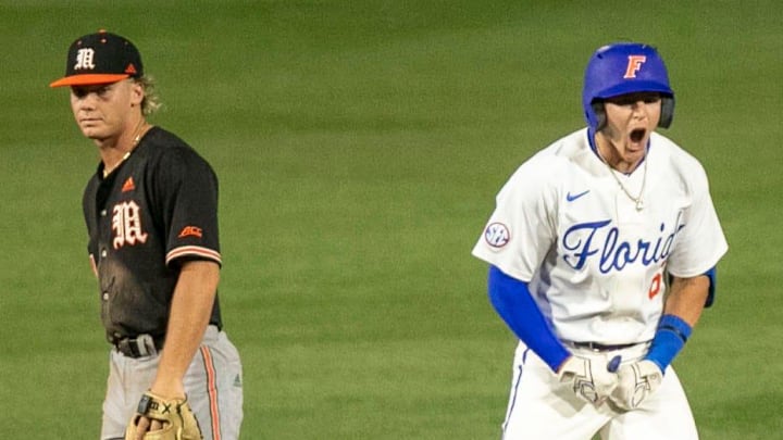 Florida's infielder Tyler Shelnut (6) with a double in the bottom of the seventh inning against the Miami Hurricanes, Friday, March 3, 2023, at Condron Family Baseball Park in Gainesville, Florida. The Gators beat the Hurricanes 10-4 in Game 1. [Cyndi Chambers/ Gainesville Sun] 2023 Gator Baseball March 3, 2023, Condron Family Ballpark Miami Hurricanes