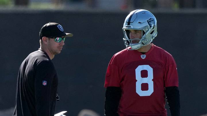 Jun 9, 2026; Henderson, NV, USA; Las Vegas Raiders coach Klint Kubiak (left) and quarterback Kirk Cousins (8) during minicamp at Intermountain Health Performance Center. Mandatory Credit: Kirby Lee-Imagn Images Jun 9, 2026; Henderson, NV, USA; Las Vegas Raiders coach Klint Kubiak (left) and quarterback Kirk Cousins (8) during minicamp at Intermountain Health Performance Center. Mandatory Credit: Kirby Lee-Imagn Images