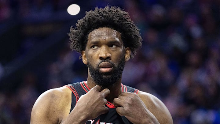 Dec 23, 2025; Philadelphia, Pennsylvania, USA; Philadelphia 76ers center Joel Embiid (21) looks on against the Brooklyn Nets during the first quarter at Xfinity Mobile Arena. Mandatory Credit: Bill Streicher-Imagn Images