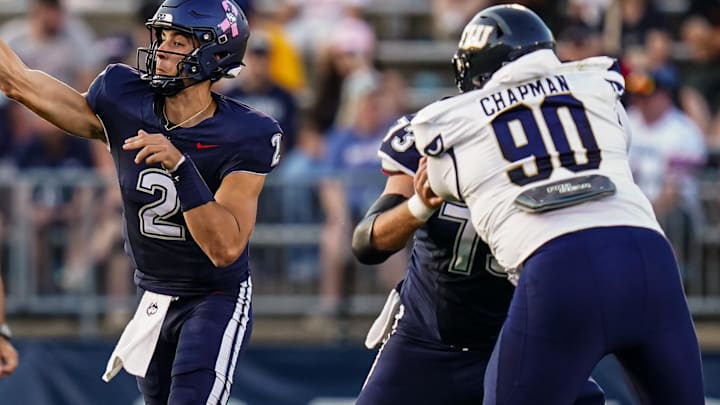 Oct 4, 2025; East Hartford, Connecticut, USA; UConn Huskies quarterback Joe Fagnano (2) throws a pass against the FIU Panthers in the third quarter at Pratt & Whitney Stadium at Rentschler Field. Mandatory Credit: David Butler II-Imagn Images