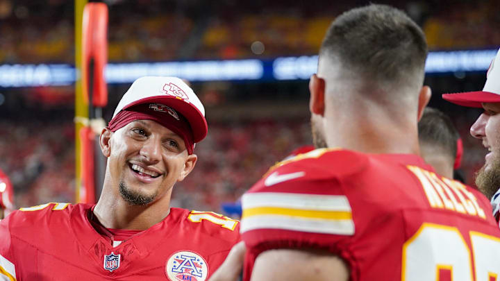 Aug 22, 2025; Kansas City, Missouri, USA; Kansas City Chiefs quarterback Patrick Mahomes (15) talks with tight end Travis Kelce (87) on the sidelines against the Chicago Bears during the first half of the game at GEHA Field at Arrowhead Stadium. Mandatory Credit: Denny Medley-Imagn Images Aug 22, 2025; Kansas City, Missouri, USA; Kansas City Chiefs quarterback Patrick Mahomes (15) talks with tight end Travis Kelce (87) on the sidelines against the Chicago Bears during the first half of the game at GEHA Field at Arrowhead Stadium. Mandatory Credit: Denny Medley-Imagn Images