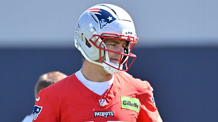 Jul 23, 2025; Foxborough, MA, USA; New England Patriots quarterback Drake Maye (10) warms up before drills at training camp at Gillette Stadium. Mandatory Credit: Eric Canha-Imagn Images