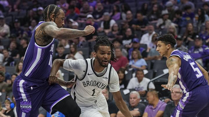 Mar 22, 2026; Sacramento, California, USA; Brooklyn Nets forward Ziaire Williams (1) dribbles against Sacramento Kings guard DeMar DeRozan (10) during the first quarter at Golden 1 Center. Mandatory Credit: Justine Willard-Imagn Images