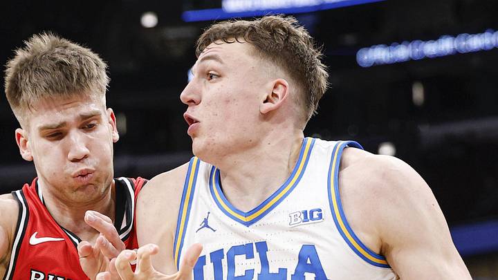 Mar 12, 2026; Chicago, IL, USA; UCLA Bruins forward Tyler Bilodeau (34) drives to the basket against Rutgers Scarlet Knights guard Harun Zrno (13) during the second half at United Center. Mandatory Credit: Kamil Krzaczynski-Imagn Images Mar 12, 2026; Chicago, IL, USA; UCLA Bruins forward Tyler Bilodeau (34) drives to the basket against Rutgers Scarlet Knights guard Harun Zrno (13) during the second half at United Center. Mandatory Credit: Kamil Krzaczynski-Imagn Images