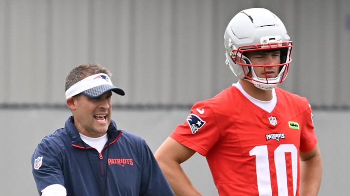 Jun 9, 2025; Foxborough, MA, USA; New England Patriots offensive coordinator Josh McDaniels directs a drill for quarterback Drake Maye (10) during minicamp at Gillette Stadium. Mandatory Credit: Eric Canha-Imagn Images