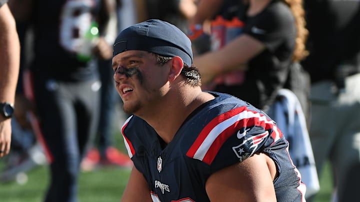 Sep 28, 2025; Foxborough, Massachusetts, USA; New England Patriots offensive tackle Will Campbell (66) talks to a teammate during the second half against the Carolina Panthers at Gillette Stadium. Mandatory Credit: Bob DeChiara-Imagn Images
