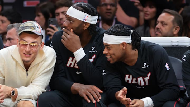 Oct 6, 2025; Miami, Florida, USA; Miami Heat guard Tyler Herro (14) watches from the bench against the Milwaukee Bucks during the first quarter at Kaseya Center. Mandatory Credit: Sam Navarro-Imagn Images