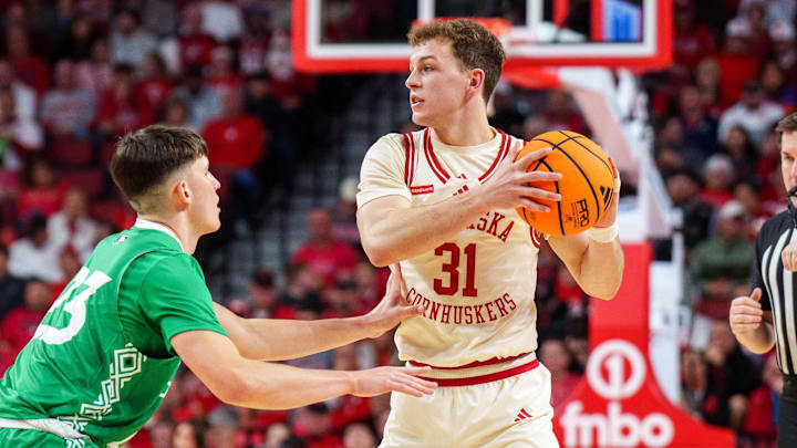 Nebraska guard Cale Jacobsen looks to pass against North Dakota guard Wylee Delorme.