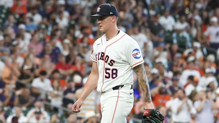 Houston Astros starting pitcher Hunter Brown (58) walks back to the dugout. 