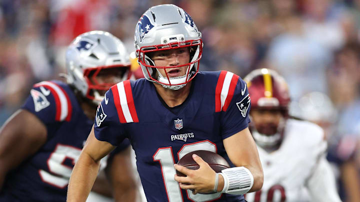 Aug 8, 2025; Foxborough, Massachusetts, USA; New England Patriots quarterback Drake Maye (10) runs the ball during the first half against the Washington Commanders at Gillette Stadium. Mandatory Credit: Paul Rutherford-Imagn Images