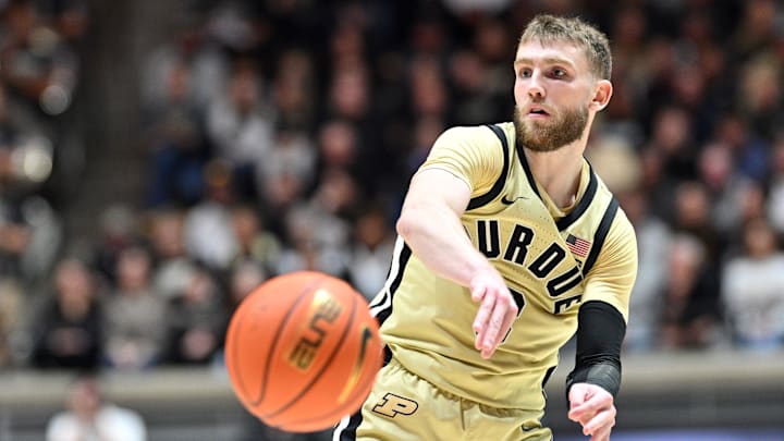 Purdue Boilermakers guard Braden Smith (3) passes around Northern Kentucky Norse guard Dan Gherezgher Jr. (0).