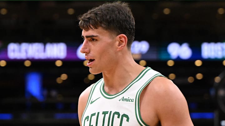 Oct 12, 2025; Boston, Massachusetts, USA; Boston Celtics center Luka Garza (52) reacts after a foul during the second half of a game against the Cleveland Cavaliers at TD Garden. Mandatory Credit: Brian Fluharty-Imagn Images