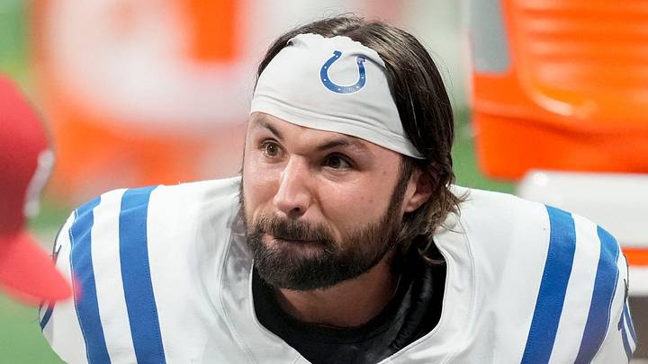 Former Indianapolis Colts quarterback Gardner Minshew sits on the bench