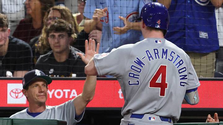 Jul 25, 2026; Pittsburgh, Pennsylvania, USA; Chicago Cubs manager Craig Counsell (middle) greets center fielder Pete Crow-Armstrong (4) returning to the dugout after hitting a two-run home run against the Pittsburgh Pirates during the seventh inning at PNC Park. Mandatory Credit: Charles LeClaire-Imagn Images Jul 25, 2026; Pittsburgh, Pennsylvania, USA; Chicago Cubs manager Craig Counsell (middle) greets center fielder Pete Crow-Armstrong (4) returning to the dugout after hitting a two-run home run against the Pittsburgh Pirates during the seventh inning at PNC Park. Mandatory Credit: Charles LeClaire-Imagn Images