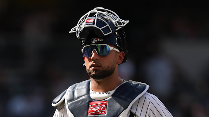 Jun 29, 2025; Bronx, New York, USA; New York Yankees catcher J.C. Escarra (25) walks off the field after the top of the eighth inning against the Athletics at Yankee Stadium. Mandatory Credit: Vincent Carchietta-Imagn Images