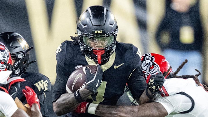 Sep 11, 2025; Winston-Salem, North Carolina, USA; Wake Forest Demon Deacons wide receiver Sterling Berkhalter (4) catches a pass in the first half against North Carolina State Wolfpack at Allegacy Federal Credit Union Stadium. Mandatory Credit: Luke Jamroz-Imagn Images Sep 11, 2025; Winston-Salem, North Carolina, USA; Wake Forest Demon Deacons wide receiver Sterling Berkhalter (4) catches a pass in the first half against North Carolina State Wolfpack at Allegacy Federal Credit Union Stadium. Mandatory Credit: Luke Jamroz-Imagn Images