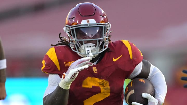 Sep 6, 2025; Los Angeles, California, USA; USC Trojans running back Waymond Jordan (2) Georgia Southern Eagles defensive back Ayden Jackson (5) and runs into the end zone for a touchdown during the second half at the Los Angeles Memorial Coliseum. Mandatory Credit: Jayne Kamin-Oncea-Imagn Images