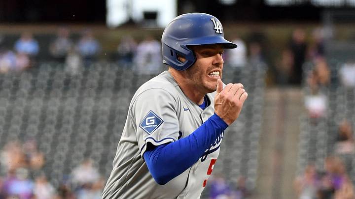 Aug 18, 2026; Denver, Colorado, USA; Los Angeles Dodgers infielder Freddie Freeman (5) scores in the first inning against the Colorado Rockies at Coors Field. Mandatory Credit: Christopher Hanewinckel-Imagn Images