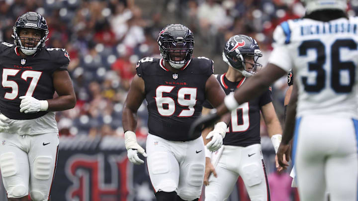 Aug 16, 2025; Houston, Texas, USA; Houston Texans offensive tackle Blake Fisher (57) and guard Ed Ingram (69) approach the line of scrimmage before a play during the game against the Carolina Panthers at NRG Stadium. Mandatory Credit: Troy Taormina-Imagn Images