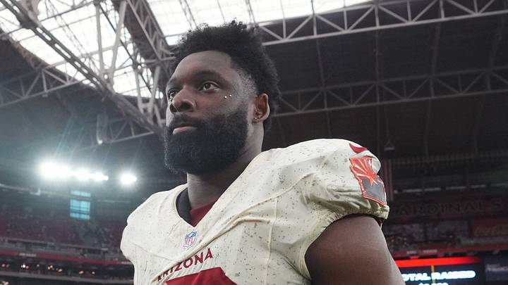 Arizona Cardinals linebacker Josh Sweat (10) walks off the field after their 31-7 loss to the Seattle Seahawks at State Farm Stadium in Glendale on Sept. 20, 2026.