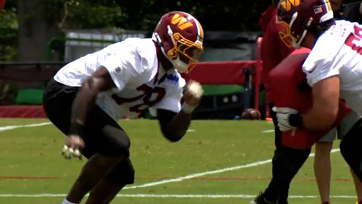 Washington Commanders left tackle Laremy Tunsil going through drills at mandatory minicamp. Washington Commanders left tackle Laremy Tunsil going through drills at mandatory minicamp.