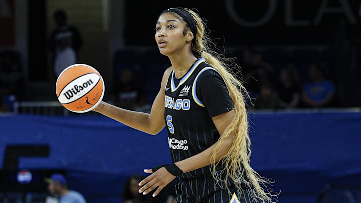 Jul 12, 2025; Chicago, Illinois, USA; Chicago Sky forward Angel Reese (5) controls the ball against the Minnesota Lynx during the second half of a WNBA game at Wintrust Arena. Mandatory Credit: Kamil Krzaczynski-Imagn Images