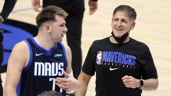 Apr 21, 2021; Dallas, Texas, USA;  Dallas Mavericks guard Luka Doncic (77) laughs with owner Mark Cuban after the game against the Detroit Pistons at American Airlines Center. Mandatory Credit: Kevin Jairaj-Imagn Images