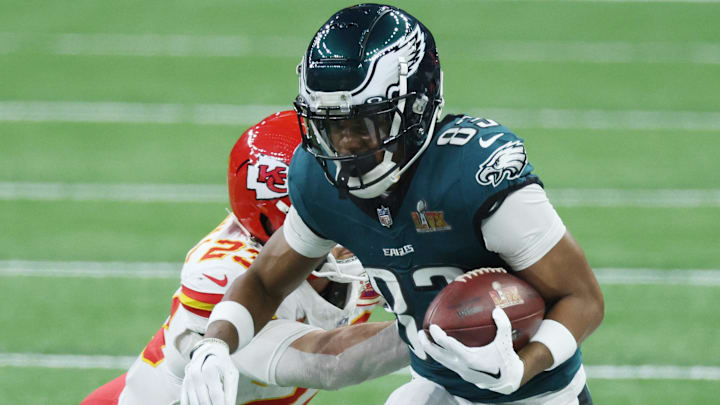 Feb 9, 2025; New Orleans, LA, USA; Philadelphia Eagles wide receiver Jahan Dotson (83) catches a pass against Kansas City Chiefs linebacker Drue Tranquill (23) in the first quarter in Super Bowl LIX at Caesars Superdome.