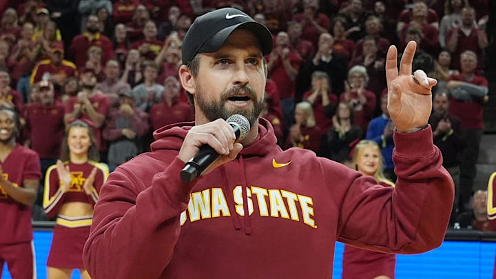 Iowa State football coach Jimmy Rogers speaks during a timeout in the Cy-Hawk men's basketball game on Dec. 11, 2025, at Hilton Coliseum in Ames.