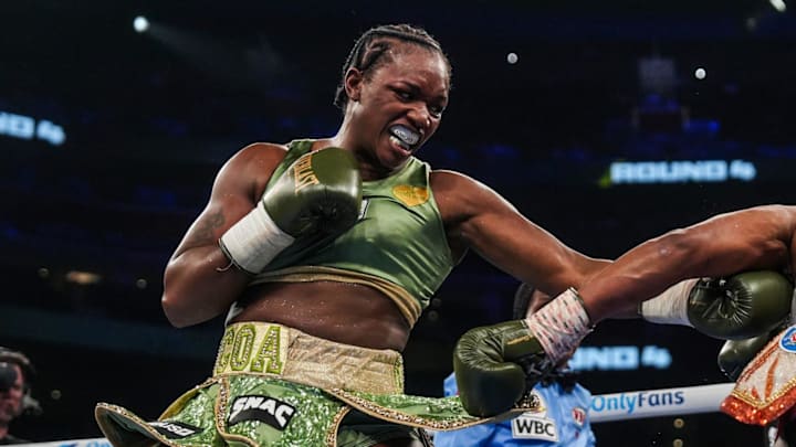 Claressa Shields, left, lands a punch on Franchon Crews-Dezurn during the heavyweight world title bout 