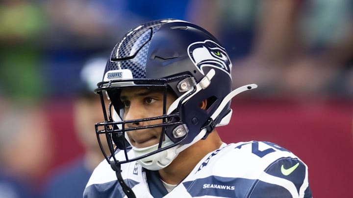 Seattle Seahawks running back Zach Charbonnet walks off the field
