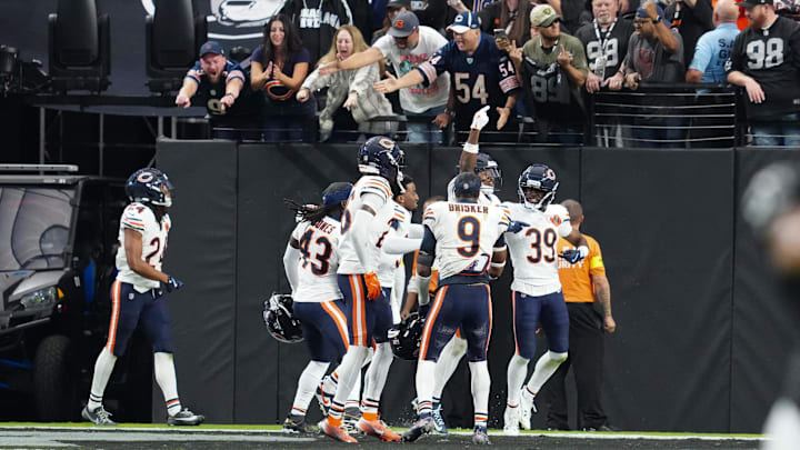 Josh Blackwell (39) celebrates after the game with teammates and Bears fans at Las Vegas.  