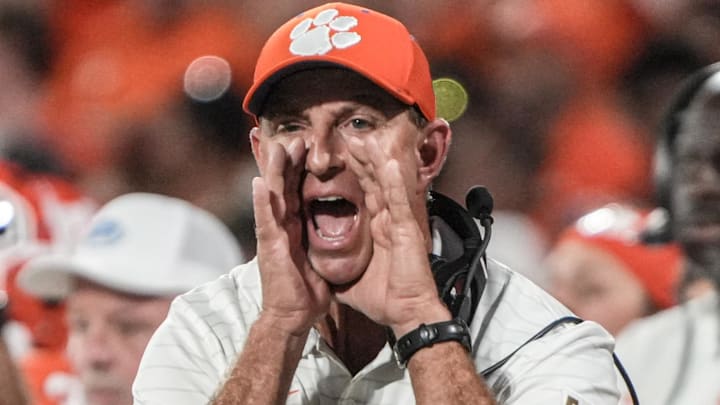 Clemson head coach Dabo Swinney communicates with a referee in the game with Louisiana State University during the second quarter at Memorial Stadium in Clemson, S.C. Saturday, Aug 30, 2025.
