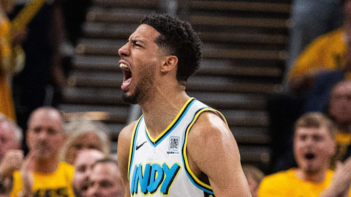 Apr 29, 2025; Indianapolis, Indiana, USA; Indiana Pacers guard Tyrese Haliburton (0) reacts during a time out during game five of the first round for the 2024 NBA Playoffs against the Milwaukee Bucks at Gainbridge Fieldhouse. Mandatory Credit: Trevor Ruszkowski-Imagn Images
