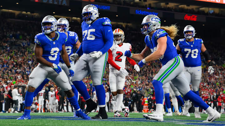 Oct 10, 2024; Seattle, Washington, USA; Seattle Seahawks running back Kenneth Walker III (9) celebrates after scoring a run against the San Francisco 49ers during the second half at Lumen Field. Oct 10, 2024; Seattle, Washington, USA; Seattle Seahawks running back Kenneth Walker III (9) celebrates after scoring a run against the San Francisco 49ers during the second half at Lumen Field.