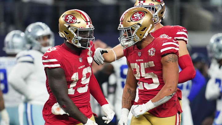 San Francisco 49ers wide receiver Deebo Samuel (19) and running back Elijah Mitchell (25)