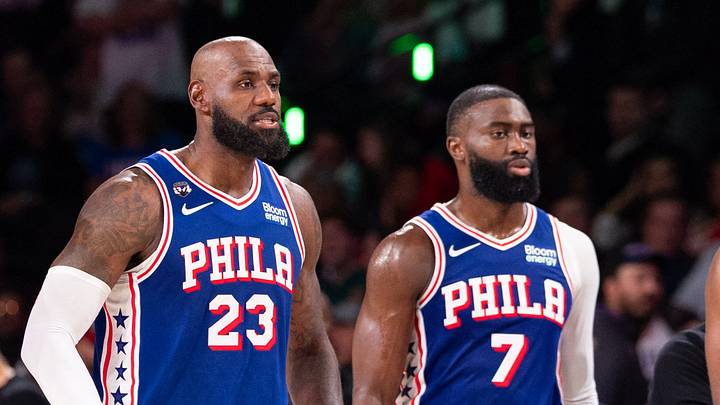 Oct 22, 2026; Philadelphia, Pennsylvania, USA; Philadelphia 76ers Joel Embiid (21) and LeBron James (23) and Jaylen Brown (7) and Tyrese Maxey (0) walk back on the court after a break in action against the Cleveland Cavaliers during the fourth quarter at Xfinity Mobile Arena. 