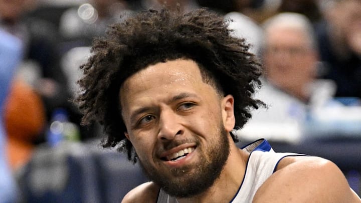 Detroit Pistons guard Cade Cunningham (2) reacts to being knocked to the floor during the second half against the Dallas Mavericks at the American Airlines Center on Mar 21, 2025. Detroit Pistons guard Cade Cunningham (2) reacts to being knocked to the floor during the second half against the Dallas Mavericks at the American Airlines Center on Mar 21, 2025.