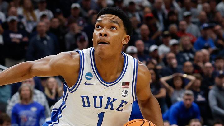 Mar 29, 2026; Washington, DC, USA; Duke Blue Devils guard Caleb Foster (1) goes to the basket against UConn Huskies forward Jayden Ross (23) in the second half during an Elite Eight game of the East Regional of the men's 2026 NCAA Tournament at Capital One Arena. Mandatory Credit: Geoff Burke-Imagn Images Mar 29, 2026; Washington, DC, USA; Duke Blue Devils guard Caleb Foster (1) goes to the basket against UConn Huskies forward Jayden Ross (23) in the second half during an Elite Eight game of the East Regional of the men's 2026 NCAA Tournament at Capital One Arena. Mandatory Credit: Geoff Burke-Imagn Images