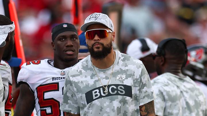 Tampa, Florida, USA; Tampa Bay Buccaneers wide receiver Mike Evans (13) looks on against the San Francisco 49ers in the fourth quarter at Raymond James Stadium. Mandatory Credit: Nathan Ray Seebeck-Imagn Images