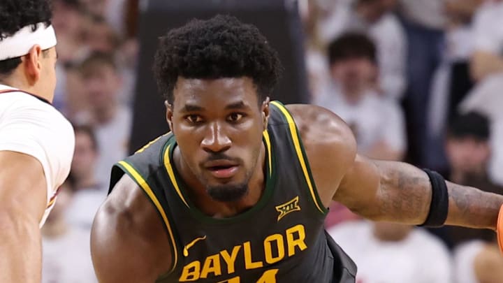 Feb 7, 2026; Ames, Iowa, USA; Iowa State Cyclones guard Tamin Lipsey (3) defends Baylor Bears guard Tounde Yessoufou (24) during the second half at James H. Hilton Coliseum. Mandatory Credit: Reese Strickland-Imagn Images