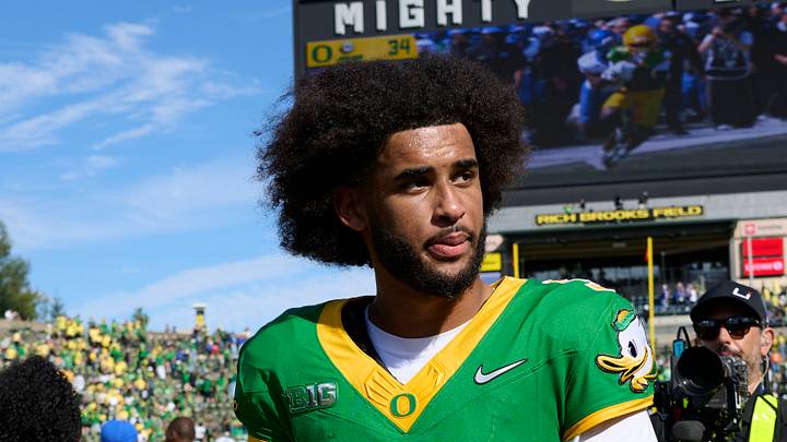Sep 5, 2026; Eugene, Oregon, USA; Oregon Ducks quarterback Dante Moore (5) walks off the field after a game against the Boise State Broncos at Autzen Stadium. Sep 5, 2026; Eugene, Oregon, USA; Oregon Ducks quarterback Dante Moore (5) walks off the field after a game against the Boise State Broncos at Autzen Stadium.