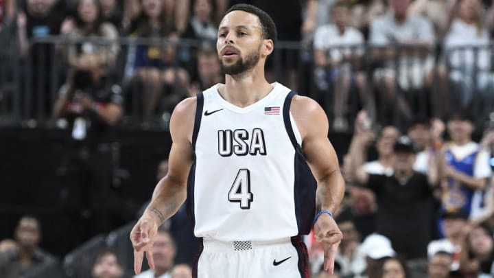 Steph Curry celebrates scoring on Canada during the first quarter of the USA Basketball Showcase at T-Mobile Arena.