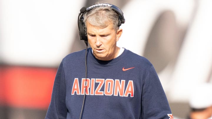 Arizona Wildcats head coach Brent Brennan walks the sideline in the fourth quarter of the NCAA football game between the Cincinnati Bearcats and Arizona Wildcats at Nippert Stadium in Cincinnati on Nov. 15, 2025.
